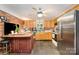 Well-equipped kitchen with modern appliances, a brick accent wall, and ample counter space at 11201 Johnson Davis Rd, Huntersville, NC 28078