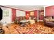 Inviting living room with comfortable seating, a patterned rug, and warm lighting at 11201 Johnson Davis Rd, Huntersville, NC 28078