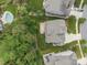 Aerial view of a beautiful home with a spacious backyard, deck, and swimming pool at 11329 Fullerton Place Nw Dr, Huntersville, NC 28078