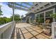 Expansive back deck with white pergola and railings, offering a relaxing outdoor space at 11329 Fullerton Place Nw Dr, Huntersville, NC 28078