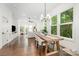 Bright and airy living space with large windows, hardwood floors, and stylish furnishings at 1207 E 36Th St, Charlotte, NC 28205