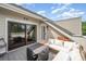 Relaxing patio with wicker furniture, barbecue grill, and scenic views of the sky at 1207 E 36Th St, Charlotte, NC 28205