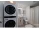 Compact bathroom with a modern vanity, updated fixtures, and washer/dryer at 1212 Frank Ext, Rock Hill, SC 29730