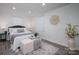 This stylish bedroom offers a modern design with calming decor at 1212 Frank Ext, Rock Hill, SC 29730
