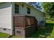Exterior side entrance with wooden railing, and vinyl siding at 1212 Frank Ext, Rock Hill, SC 29730