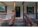 Front porch detail showing house number, decorative wreath, and painted porch railings at 1212 Frank Ext, Rock Hill, SC 29730