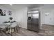 Contemporary kitchen with stainless steel refrigerator and adjacent breakfast nook at 1212 Frank Ext, Rock Hill, SC 29730