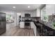 Modern kitchen with white cabinets, stainless steel appliances, and stylish backsplash at 1212 Frank Ext, Rock Hill, SC 29730