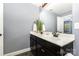 Bathroom featuring double sinks and neutral wall color at 12304 Huntersville Concord Rd, Huntersville, NC 28078