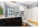 Bathroom featuring double sinks and a shower-tub combo at 12304 Huntersville Concord Rd, Huntersville, NC 28078