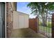 Private patio area with brick walls, storage shed, and access to the backyard at 1330 5Th Ne St, Hickory, NC 28601
