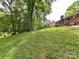 Large, well-maintained backyard with plenty of green space for outdoor activities at 13617 Lake Bluff Dr, Matthews, NC 28105