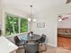 Cozy breakfast nook, featuring a large window and modern decor at 13617 Lake Bluff Dr, Matthews, NC 28105