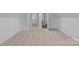 A large attic room featuring neutral carpet at 15400 Groveland St, Huntersville, NC 28078
