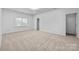 Neutral bedroom featuring neutral carpet and light walls at 15400 Groveland St, Huntersville, NC 28078