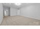 Neutral bedroom featuring neutral carpet and light walls at 15400 Groveland St, Huntersville, NC 28078