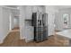 Modern kitchen featuring stainless steel refrigerator with lots of cabinet space at 15400 Groveland St, Huntersville, NC 28078
