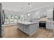 Bright kitchen featuring a center island, stainless appliances, and a breakfast nook at 15400 Groveland St, Huntersville, NC 28078