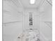 Large walk-in closet featuring marble floors and custom wire shelving at 15400 Groveland St, Huntersville, NC 28078