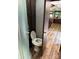 Bathroom with toilet, shower, and open layout to the main living area at 155 Indian Harbor Trl # E243, Mount Gilead, NC 27306
