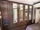 Comfortable bedroom featuring a wall of wardrobe closets with mirrored doors at 155 Indian Harbor Trl # E243, Mount Gilead, NC 27306
