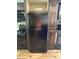 Modern kitchen equipped with black refrigerator, cabinets, and appliances at 155 Indian Harbor Trl # E243, Mount Gilead, NC 27306