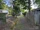 Long driveway, leading to the home offering privacy and seclusion from the road at 160/162 Arrowood Trl # F28/F29, Mount Gilead, NC 27306