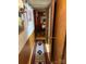 Narrow hallway features a decorative rug leading to the bedroom at the end of the hall at 160/162 Arrowood Trl # F28/F29, Mount Gilead, NC 27306