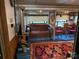 Living room featuring comfortable sofa, carpet, and television at 160/162 Arrowood Trl # F28/F29, Mount Gilead, NC 27306