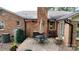 Backyard patio with brick flooring, outdoor seating and umbrella, perfect for relaxing at 1695 Arden Dr, Lincolnton, NC 28092