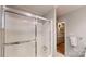Bathroom with enclosed shower, tile flooring, and access to the other rooms in the house at 1695 Arden Dr, Lincolnton, NC 28092