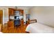Bedroom featuring a hard wood floor, desk, computer and built in shelves at 1695 Arden Dr, Lincolnton, NC 28092