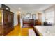 Bedroom with a wooden dresser, hard wood floors, and light gray walls at 1695 Arden Dr, Lincolnton, NC 28092