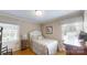 Comfortable bedroom with hardwood floors and natural light at 1695 Arden Dr, Lincolnton, NC 28092