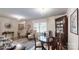 Charming dining room with traditional furnishings, chandelier lighting, and natural light from windows at 1695 Arden Dr, Lincolnton, NC 28092