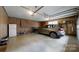 Spacious garage with ample storage, cabinets, and room for parking a car at 1695 Arden Dr, Lincolnton, NC 28092