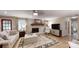 Cozy living room with fireplace, plush seating, and stylish decor at 1695 Arden Dr, Lincolnton, NC 28092