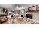 Open concept living area with fireplace connecting to the kitchen at 1695 Arden Dr, Lincolnton, NC 28092