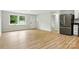 Open-concept living room flowing into the kitchen, showcasing modern appliances and natural light at 1837 6Th Nw Ave, Hickory, NC 28601