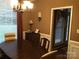 Elegant dining room with a large table, chandelier, and neutral color scheme at 1842 Caroline Way, Fort Mill, SC 29715