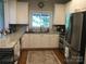 Bright kitchen with stainless steel appliances, granite countertops, and ample cabinet space at 1842 Caroline Way, Fort Mill, SC 29715