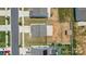 Aerial view of the home's roof, backyard with shed, and concrete patio at 2011 Valdosta Way, Charlotte, NC 28215