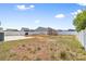 Large backyard with a shed, concrete patio, and grill at 2011 Valdosta Way, Charlotte, NC 28215