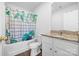 Bathroom featuring a shower-tub combo with a patterned shower curtain at 2011 Valdosta Way, Charlotte, NC 28215