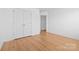 Comfortable bedroom with hardwood floors and ample closet space at 2011 Valdosta Way, Charlotte, NC 28215