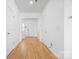 Bright entryway with hardwood floors, white walls, and natural light creates an inviting entrance at 2011 Valdosta Way, Charlotte, NC 28215