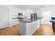 Modern kitchen featuring granite countertops, stainless steel appliances, and ample cabinet space at 2011 Valdosta Way, Charlotte, NC 28215