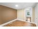 Cozy bedroom with hardwood floors and neutral wall colors at 202 Glenn Ave, Kannapolis, NC 28081