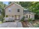 Charming home featuring a welcoming front porch, landscaped yard, and inviting curb appeal at 202 Glenn Ave, Kannapolis, NC 28081