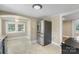 Bright kitchen area features modern appliances and neutral tones at 202 Glenn Ave, Kannapolis, NC 28081